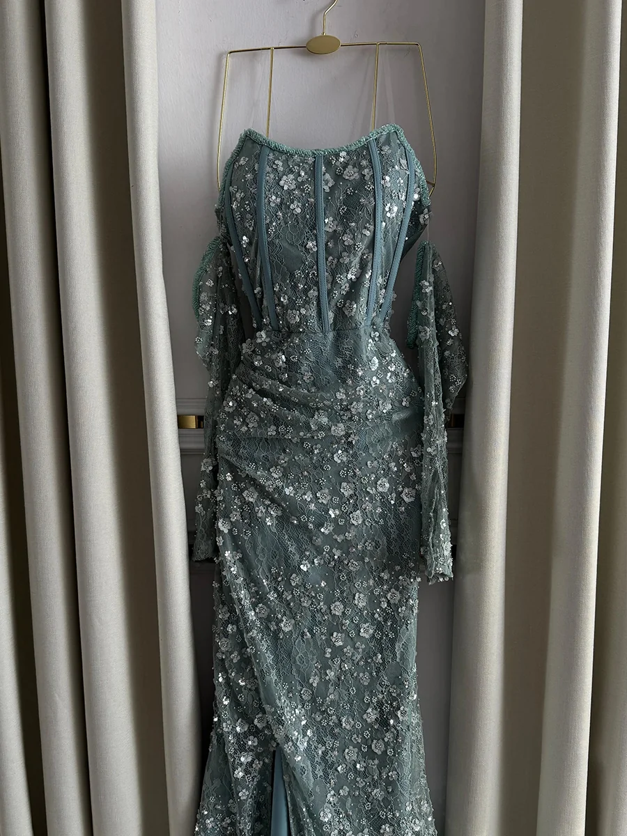 فستان أزرق فاتح مطرز بالكامل