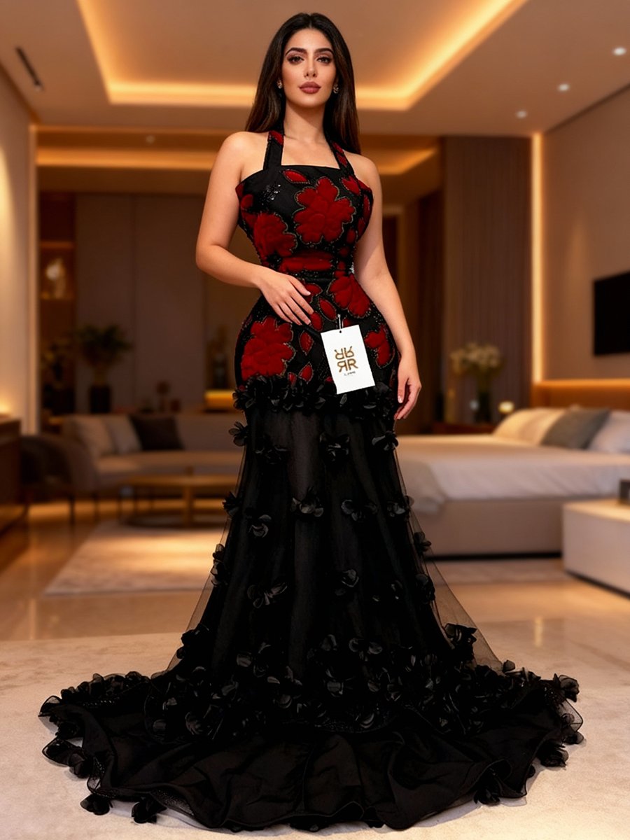 فستان سهرة أسود بتطريز أحمر وتنورة طبقات فاخرة